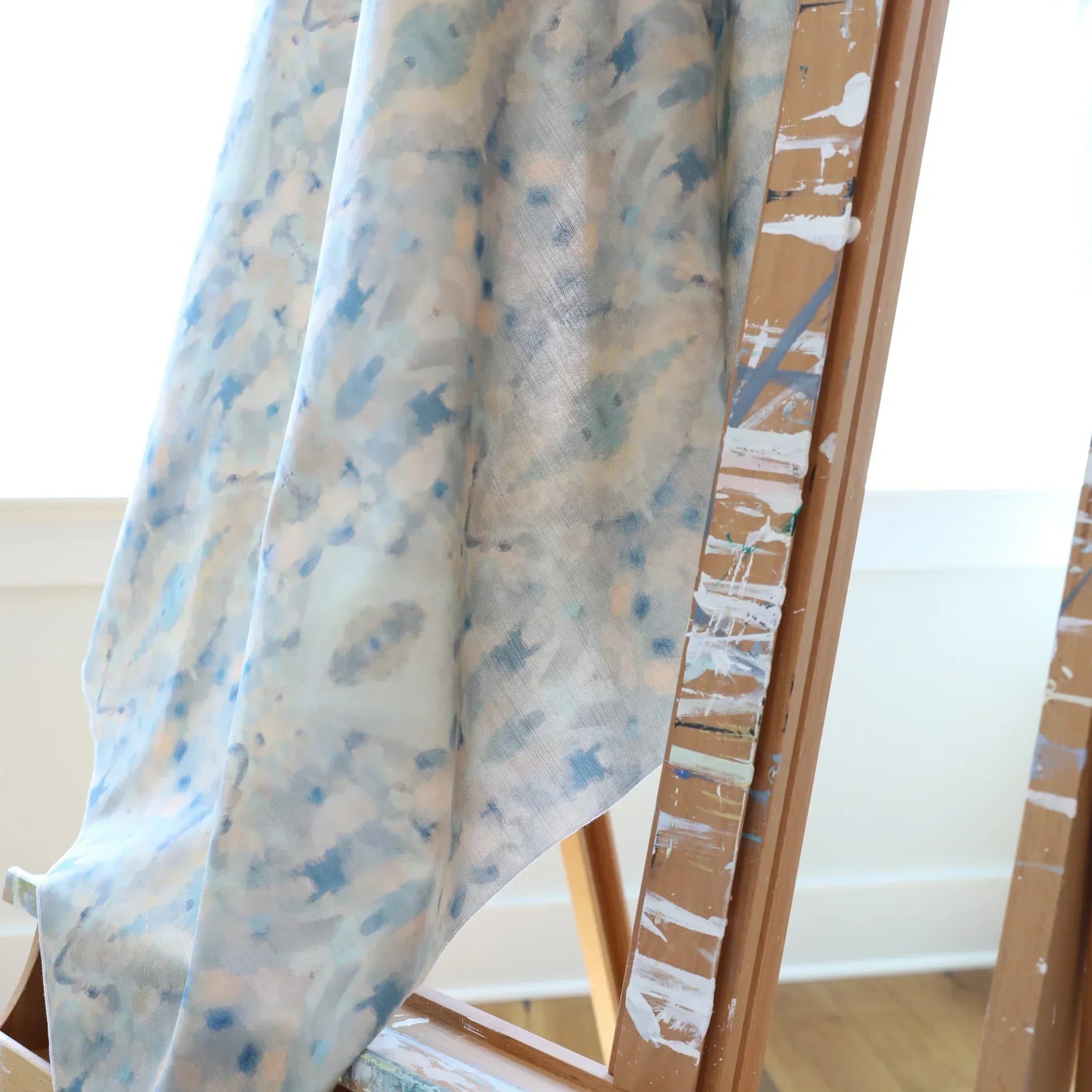 Luxury abstract fabric with layered organic movement inspired by Colorado River rock, designed for drapery, upholstery, bedding, and modern traditional interiors. Large-scale pattern with soft tonal variation and natural texture for collected luxury homes. Sustainably printed and handcrafted in England by Truett Designs.