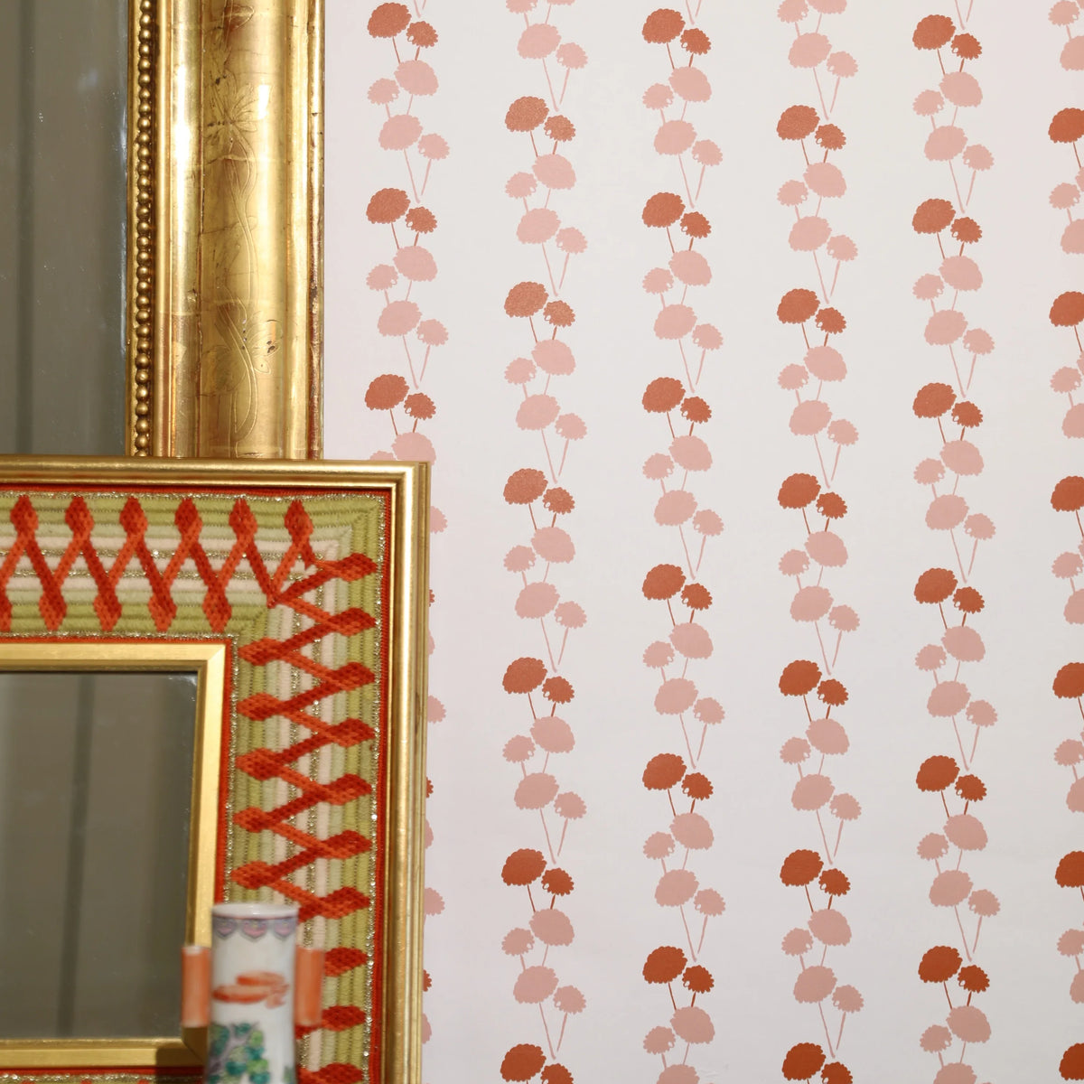 Luxury botanical and floral wallpaper featuring an elegant linear dahlia vine pattern inspired by English gardens, designed for modern traditional interiors, powder rooms, bedrooms, dining spaces, and layered luxury homes. Sustainably printed in England by Truett Designs.