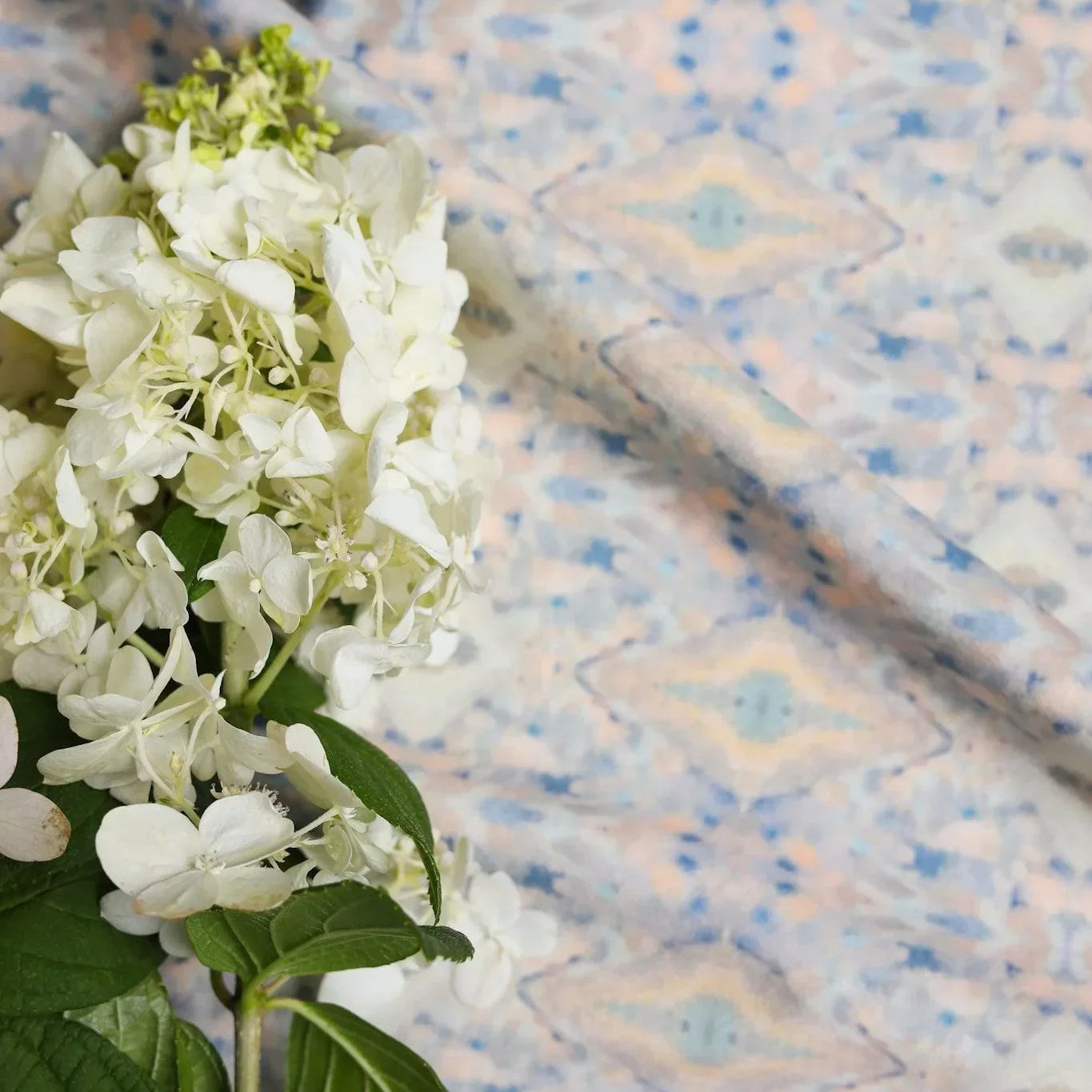 Luxury abstract fabric with layered organic movement inspired by Colorado River rock, designed for upholstery, drapery, bedding, and modern traditional interiors. Small-scale repeat with soft tonal variation and natural texture for collected luxury homes. Sustainably printed and handcrafted in England by Truett