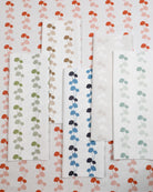 Luxury linear floral fabric with elegant dahlia vine pattern inspired by English gardens, ideal for drapery, upholstery, and refined layered interiors.