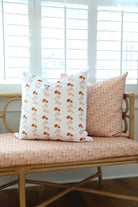 Luxury floral decorative pillow featuring the Dahlia Vine pattern, inspired by blooming dahlias and winding vines, for modern traditional and collected interiors.