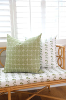 Luxury floral decorative pillow featuring the Dahlia Vine pattern, inspired by blooming dahlias and winding vines, for modern traditional and collected interiors.