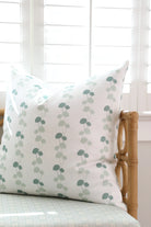 Luxury floral decorative pillow featuring the Dahlia Vine pattern, inspired by blooming dahlias and winding vines, for modern traditional and collected interiors.